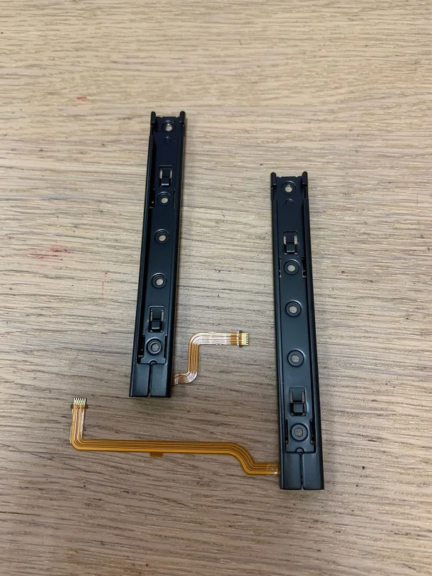 20ピース/ロットNintendo Switch用の新しいオリジナルスライディングレールアセンブリ,左右のソケットアセンブリ