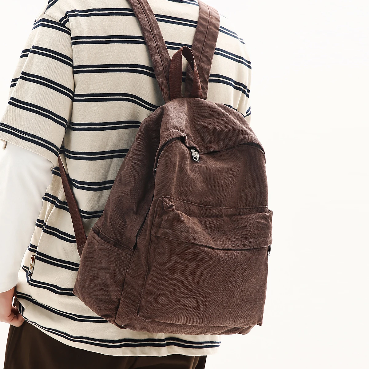 

2026 New Trendy Simple Lightweight Nylon Canvas Casual Travel Backpack Versatile Outdoor Backpack Student Solid Color