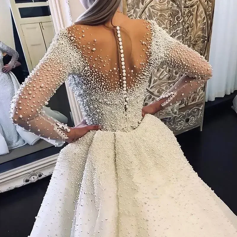 

Customized High-end Pearl Heavy Beaded Long Sleeve Wedding Dresses Dubai Wedding Gowns With Detachable Tail 2025