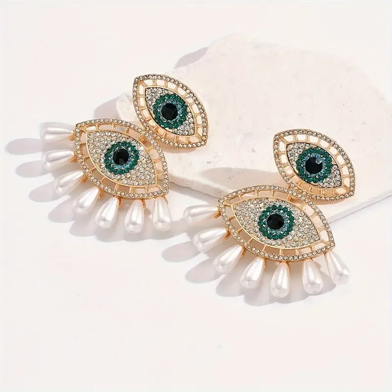 A Set of Stylish Earrings Featuring Vibrant Rhinestones And Pearls, Designed with Evil Eye Motifs, Perfect As Gifts for Women