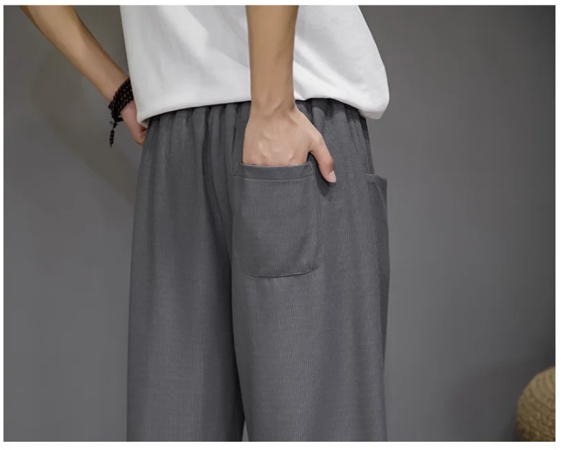 Alta calidad Waffle Ice Pantalones de seda para los hombres de gran tamaño 5XL verano fresco hasta el tobillo pantalones japoneses de moda suelta Pantalones de pierna ancha