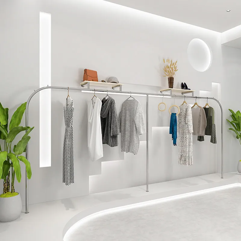 

Настенная вешалка для одежды из нержавеющей стали с серебристой матовой отделкой, простая вешалка для демонстрации женской одежды в магазине.