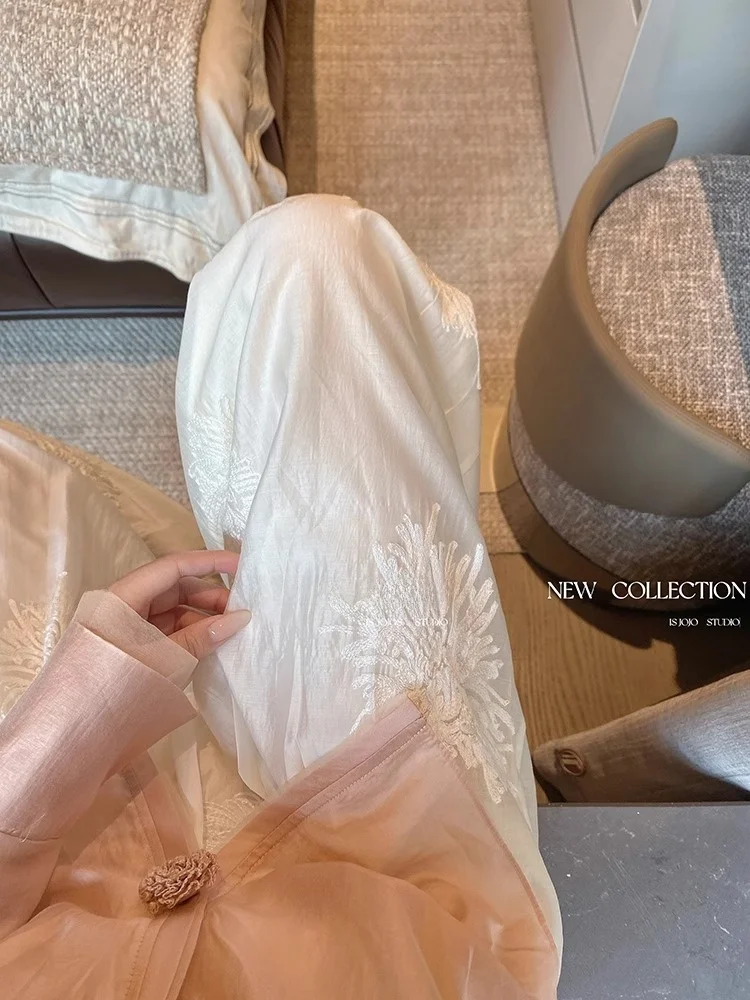 Pantaloni a gamba larga ricamati bianchi Pantaloni estivi larghi dal taglio dritto da donna Nuovi pantaloni casual cinesi Sle Pendolari Sle