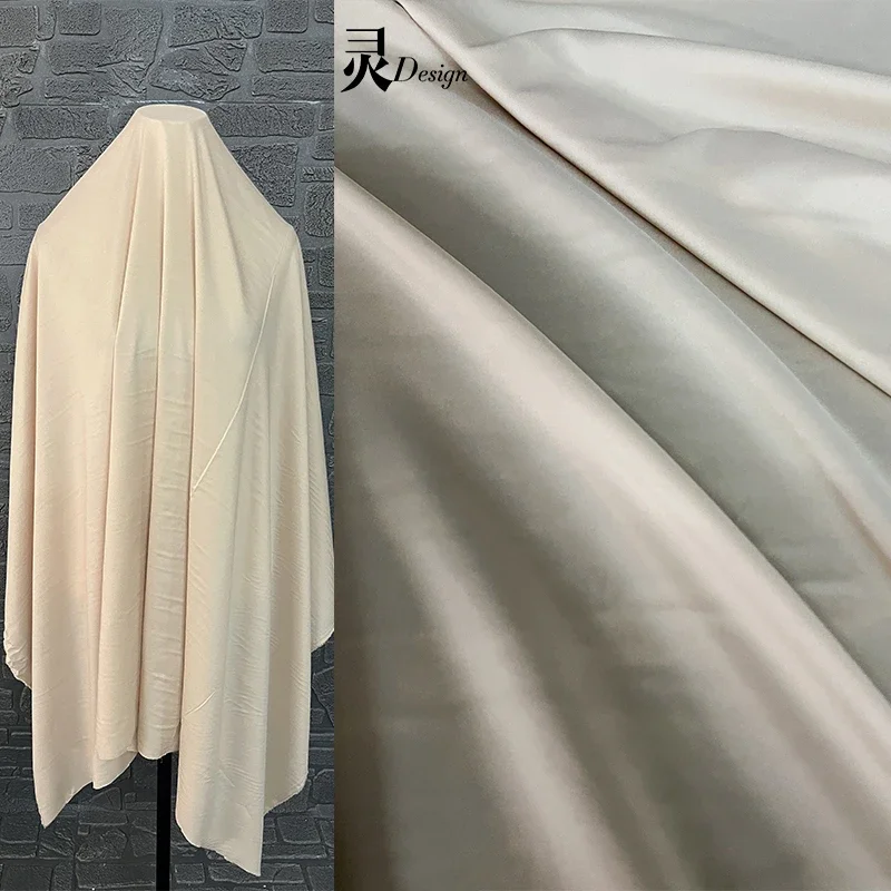 アプリコットの裏地付きドレス生地,柔らかいチャイナドレス,結婚式の衣類,デザイナー,メートルあたりの縫製素材