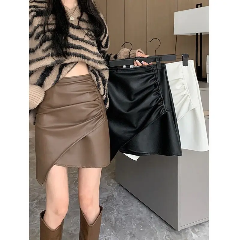 

Spice Girl Irregular PU Leather Skirt 2025 Autumn and Winter New High Waist A-word Pleated Hip-wrapped Short Skirt