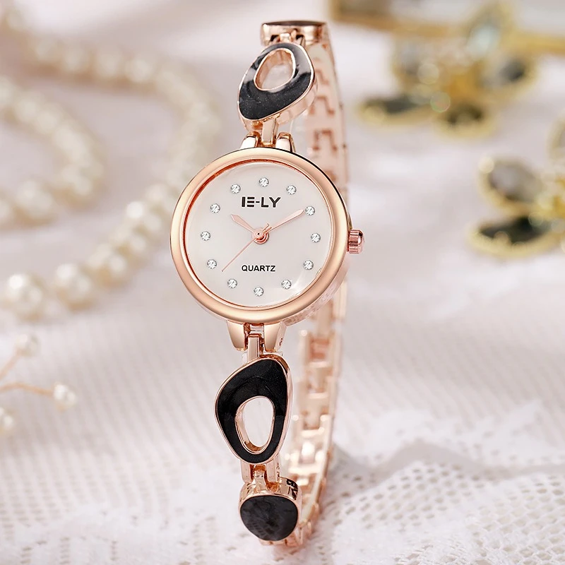 Nova pulseira relógio feminino luz luxo nicho temperamento elegante sênior senso de esqueleto irregular relógio de pulso