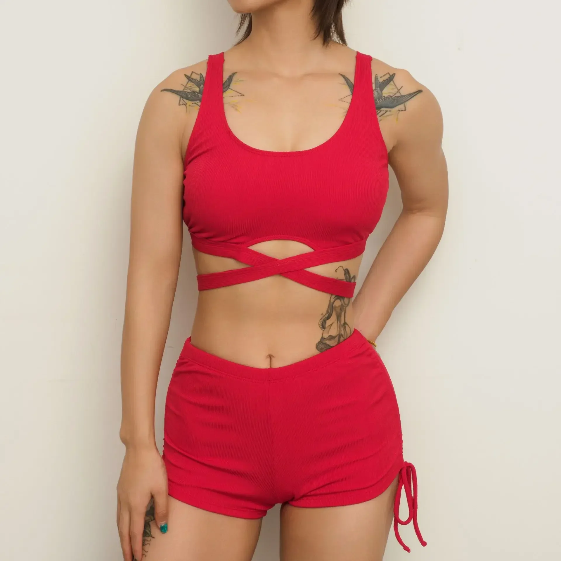 2025 Nuovo costume da bagno a 2 pezzi per donna a vita alta tinta unita croce scava fuori bikini set costume da bagno senza schienale per vacanze al mare