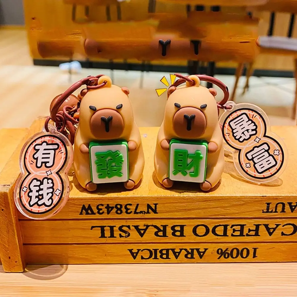 Cartoon Fa cai Capybara Mahjong Keychain Puppy Funny Capybara Keyring Silica gel Doll Water Porpoise Dolphin Keychain Couple