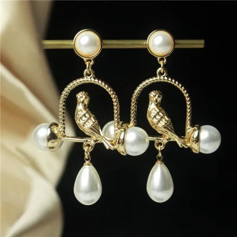 French court exaggerated water drop bird cage Pearl earrings delicate bird earrings 925 Silver needle Stud earrings