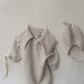beige con sombrero