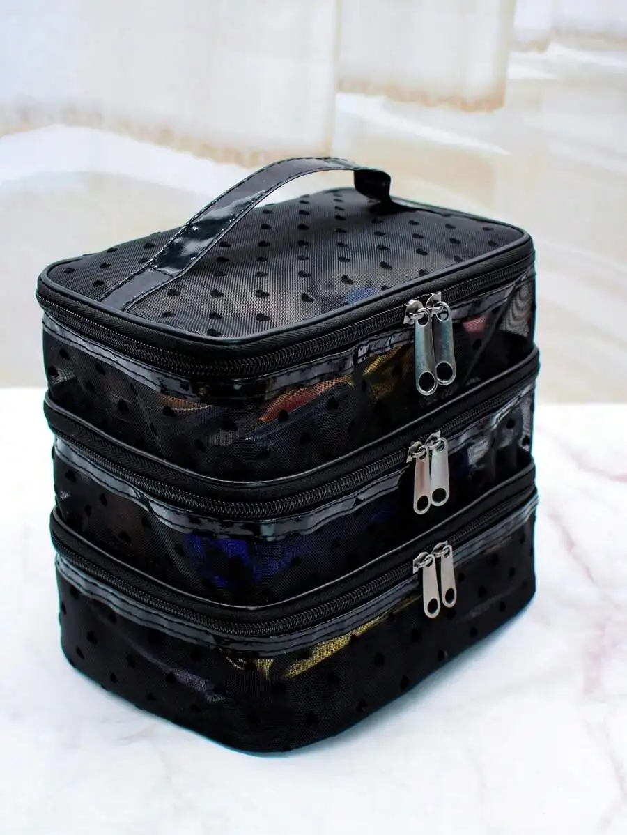 

3-Tier Black Mesh Cosmetic Organizer Bag with Perforated Design and Top Handle