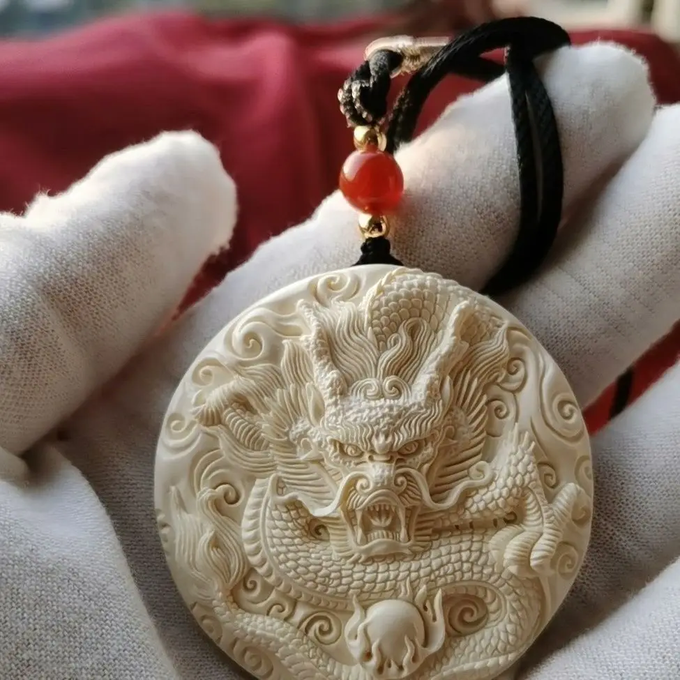 

Ivory fruit Longfeng Round Brand Hand-carved Round Dragon Brand Double-sided Seiko men's and women's brand pendants