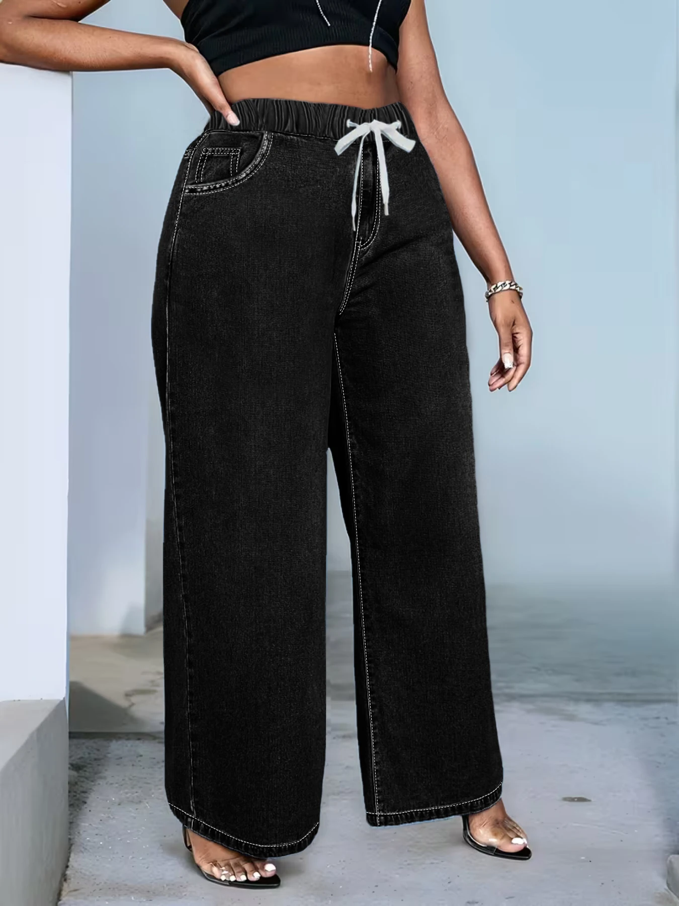 Plus-size women's loose straight-leg jeans, simple belt design, washed high-waisted style. view 4