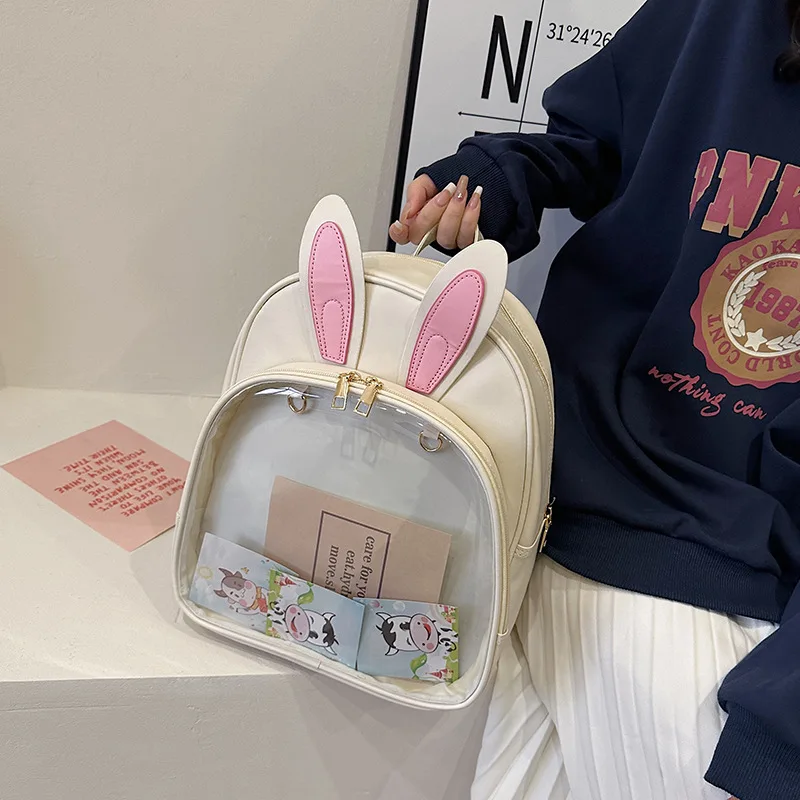 

Clear PVC Transparent Cartoon Shoulder Backpack Women PU Letter Harajuku Rucksack For Teenage Girls Cute JK Itabag Mochila Mujer