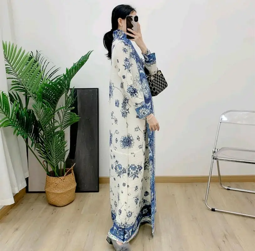 abaya ethnic style print pleated long cape coat miyake Women's spring/Summer 2024 large lapel lace-up cardigan top long