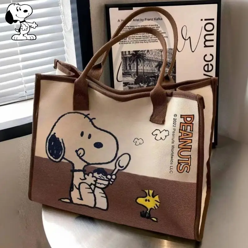 

Cartoon Snoopy 2024 New Canvas Bag College Student Class Bag Handbag Snoopy Stuff Large Capacity One Shoulder Commuting Tote Bag