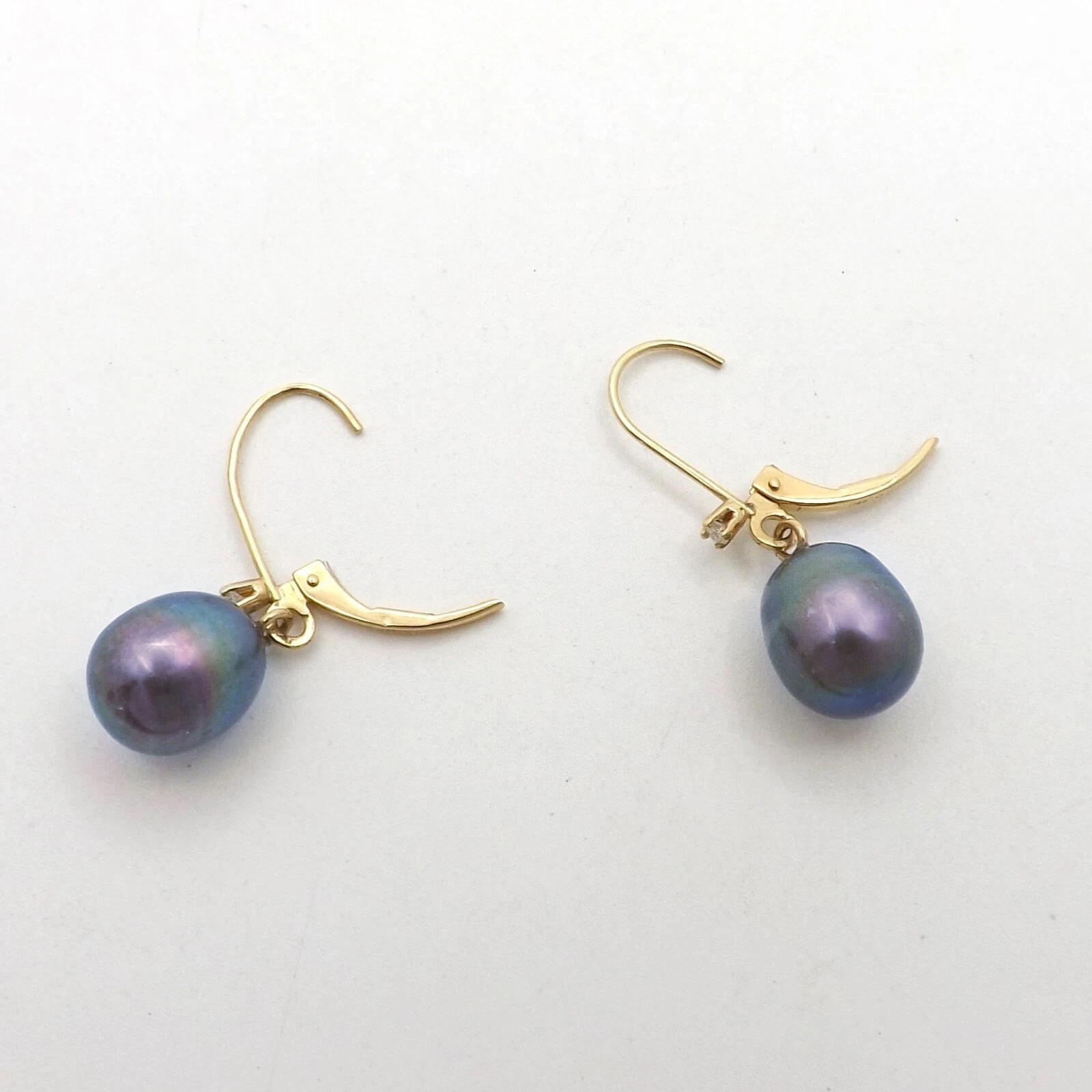 

Timeless Natural 7-8mm AAA+ South Sea Peacock Black Pearl Earrings Lever Back Suitable For Any Occasion
