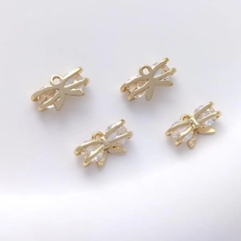 

1Pcs Copper Charms 14K Gold Color Bow Bag Zirconium Pendant Inlaid Zircon Bow Pendant DIY Handmade Jewelry Pendant Accessories