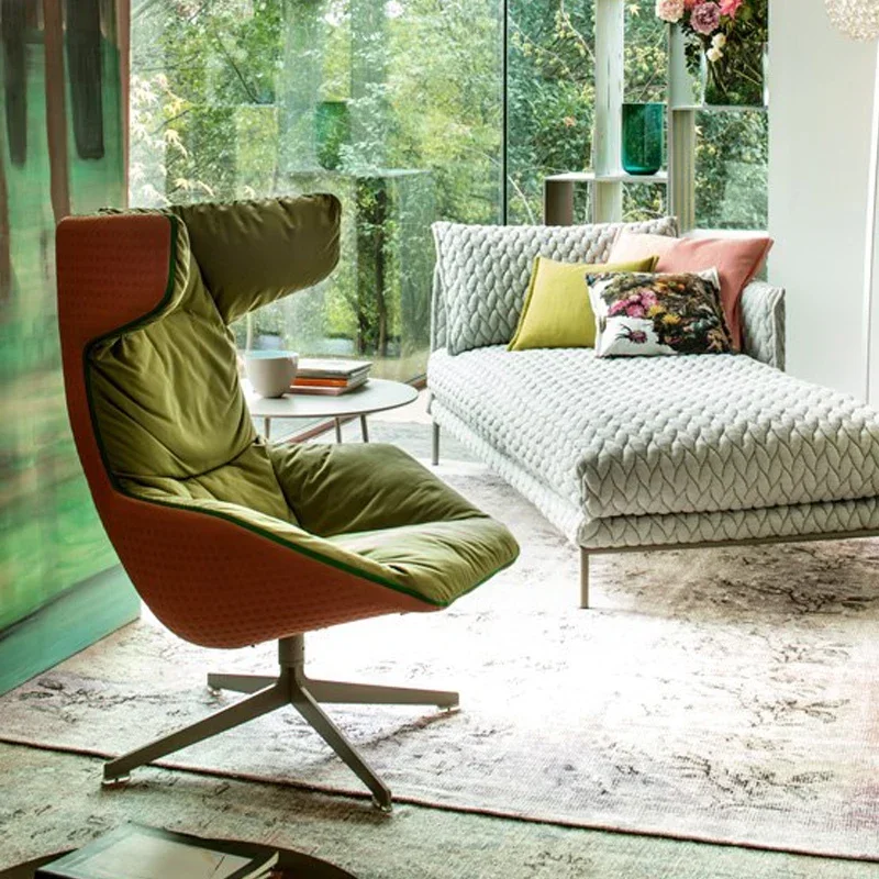 

A modern velvet lounge chair Revolving Fabric leisure chair hotel furniture Living Room sofa stool chair