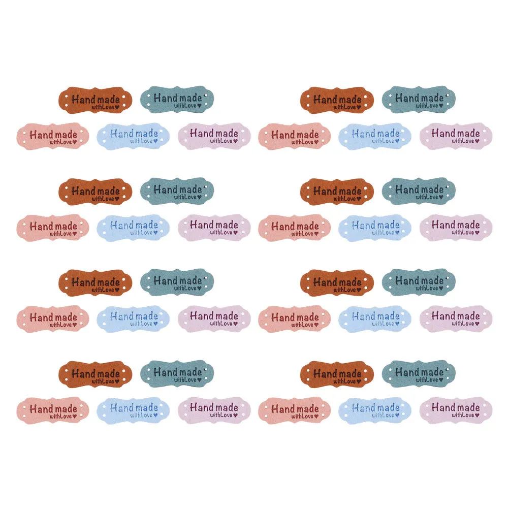 

100Pcs Handmade Embossed Suede Labels Two Hole Sewing Tags Clothing Hats Fabric for DIY Accessories Handmade Label Tags