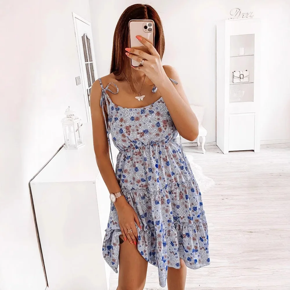 New European and American spring and summer express sales small floral temperament commuter shoulder strap sexy dress 8558