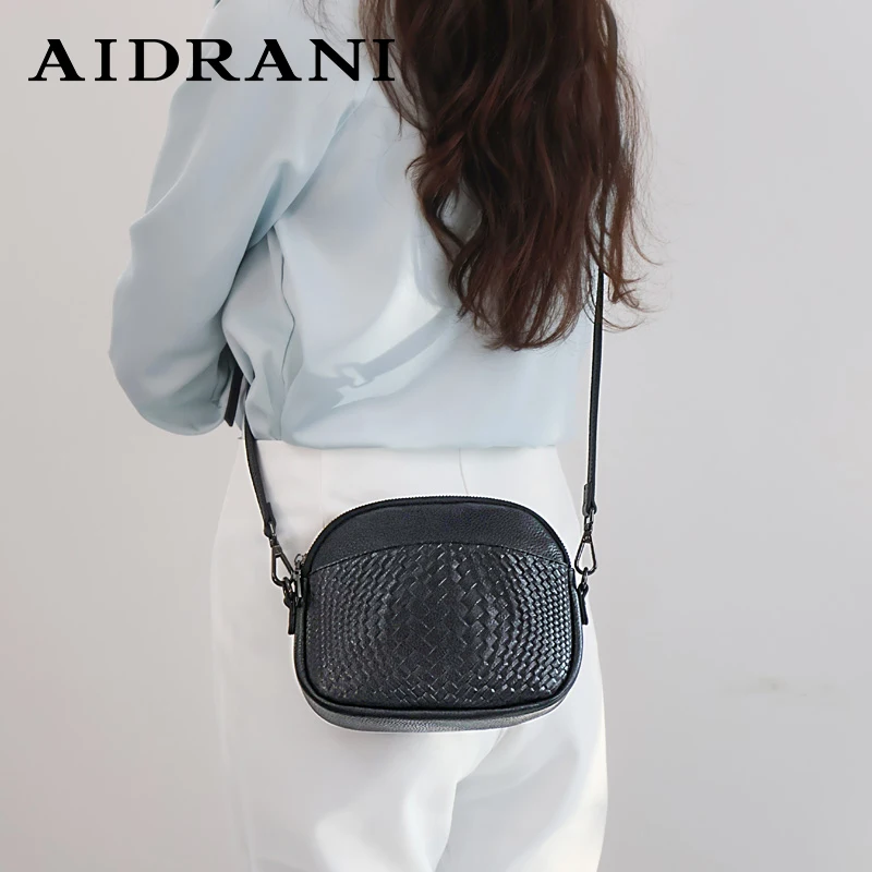 Aidrani  New women\'s single shoulder crossbody bag, made of cowhide material, with black circular bag printed with woven texture