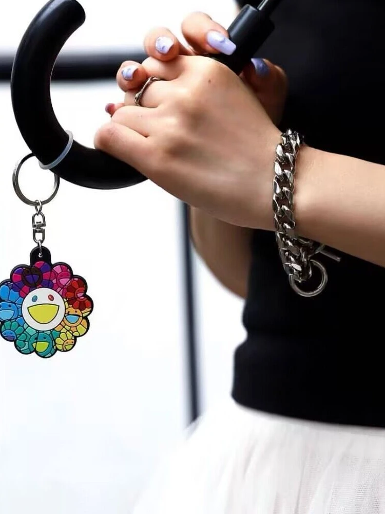 سلسلة مفاتيح على شكل عباد الشمس من تاكاشي، هدية إبداعية، قلادة دراجة نارية صغيرة، حامل مفاتيح من الفولاذ المقاوم للصدأ بأسلوب...