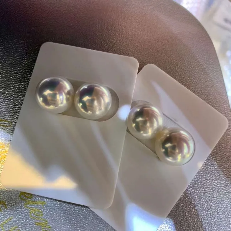 11–12 mm weiße, runde, natürliche Perle mit Satinstruktur