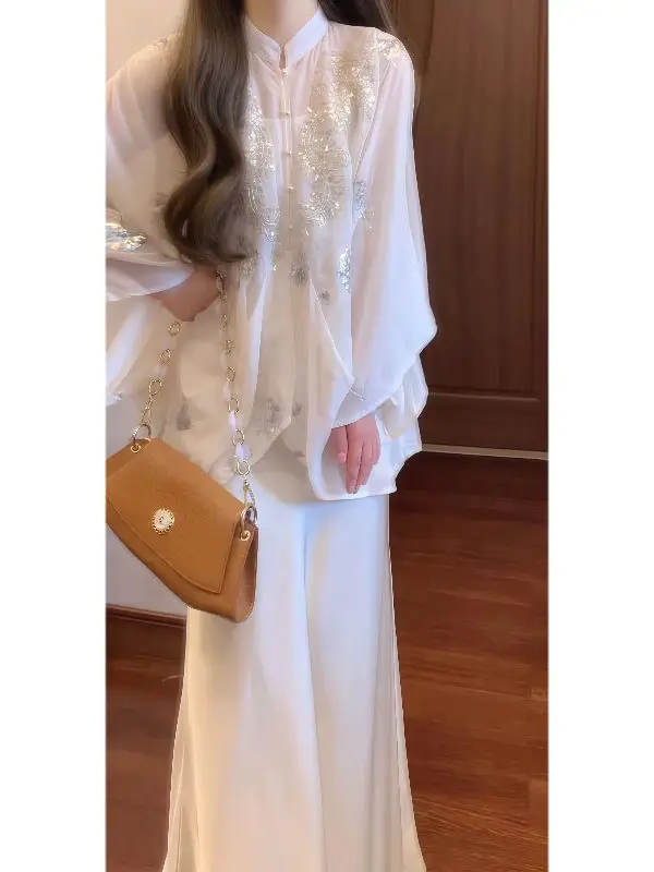 

Весенний комплект 2026 в китайском стиле: модный национальный наряд с юбкой-«рыбьим хвостом» и топом, элегантный и трендовый, для создания уникального образа.