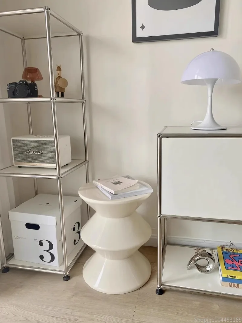 

Stylish Nordic Plastic Hourglass Stool, Perfect for Small Spaces, Bedside, Living Room, and Shoe Changing