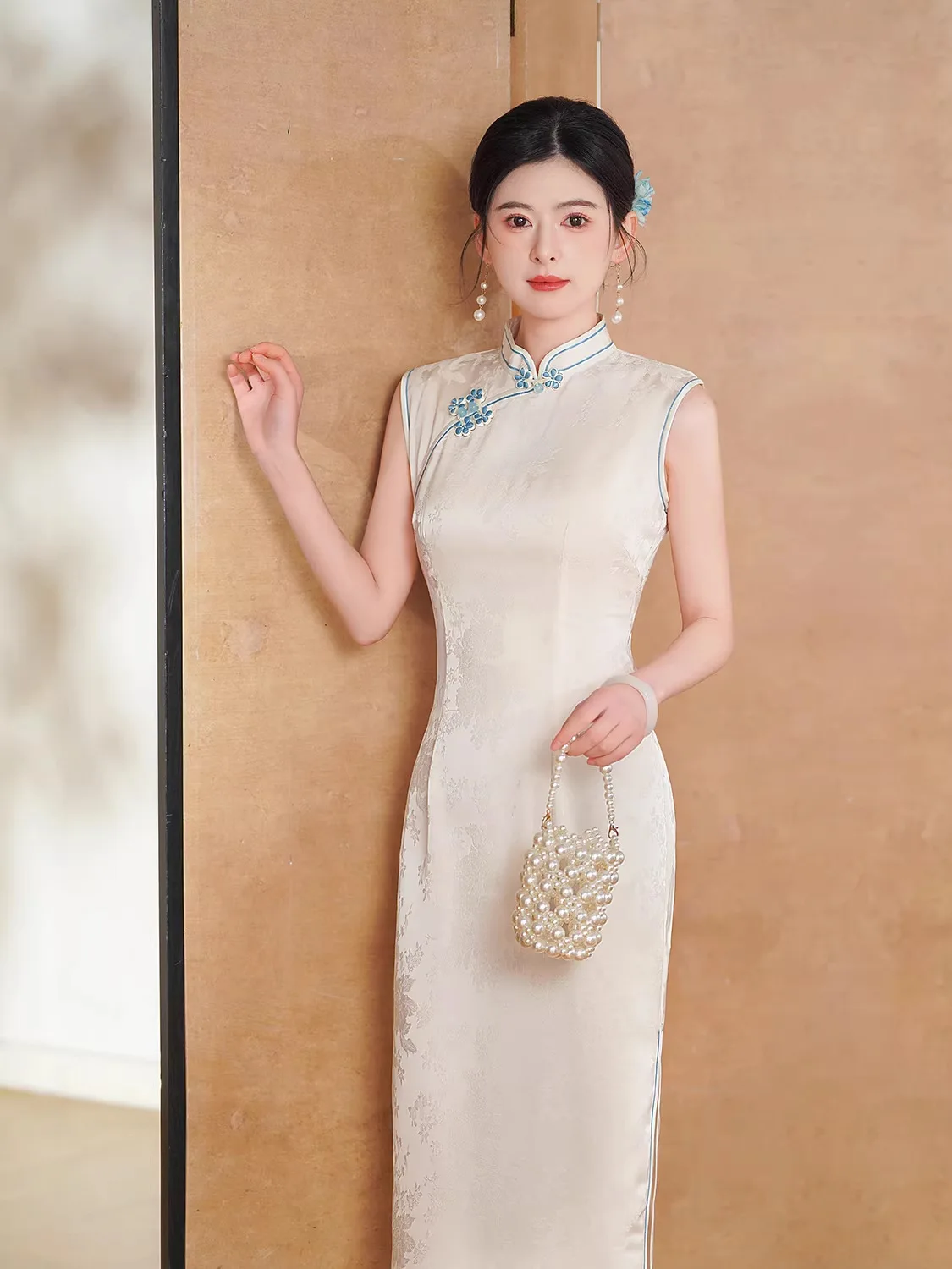 

2026 New Chinese Style Improved Cheongsam White Printed Dress Sleeveless Slim Fit Long Style Elegant Qipao Dress
