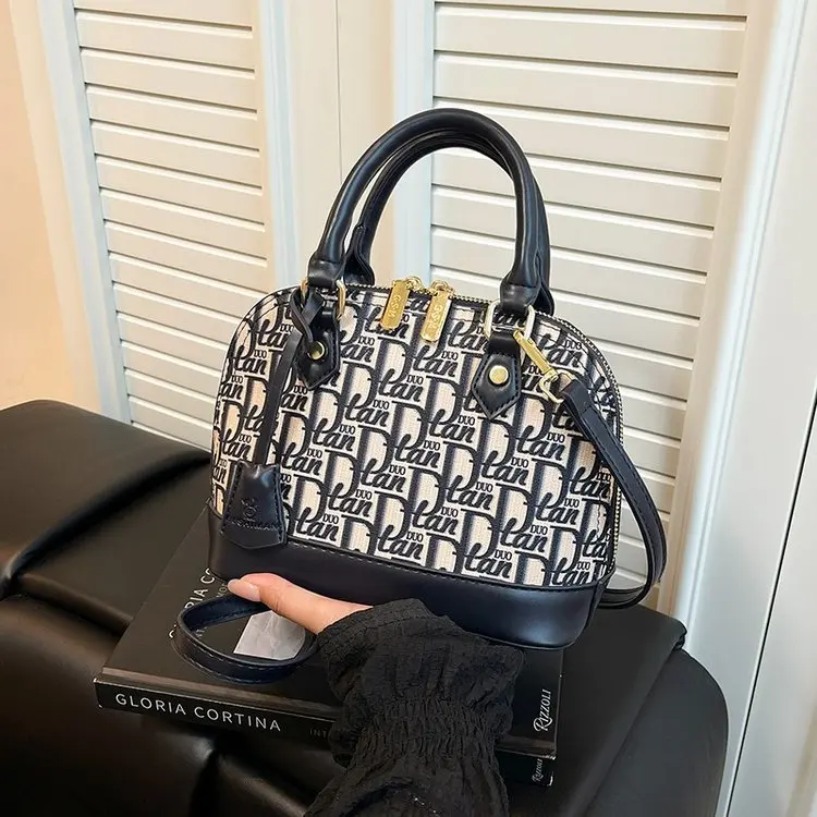 

Elegant Fashion Large Capacity Diaper Bags For Ladies Parisian Inspired Messenger Bag Simple Crossbody Bag Luxury Brand Vintage