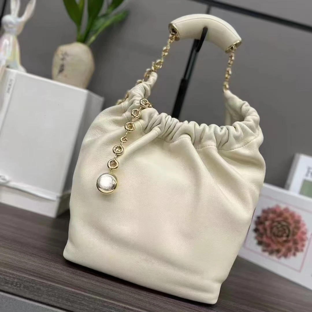 2024 new designer creased soft leather star and moon bag large capacity commuting versatile chain shoulder tote bag for women