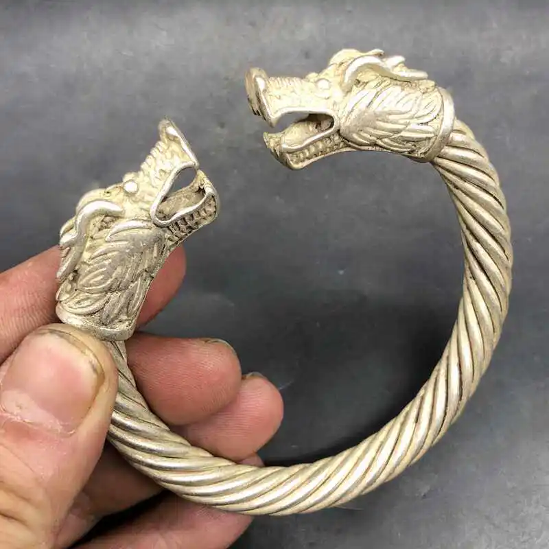 Antique miscellaneous items, antique-style dragon head, Fried Dough Twists, double dragons playing with a pearl, copper bracelet