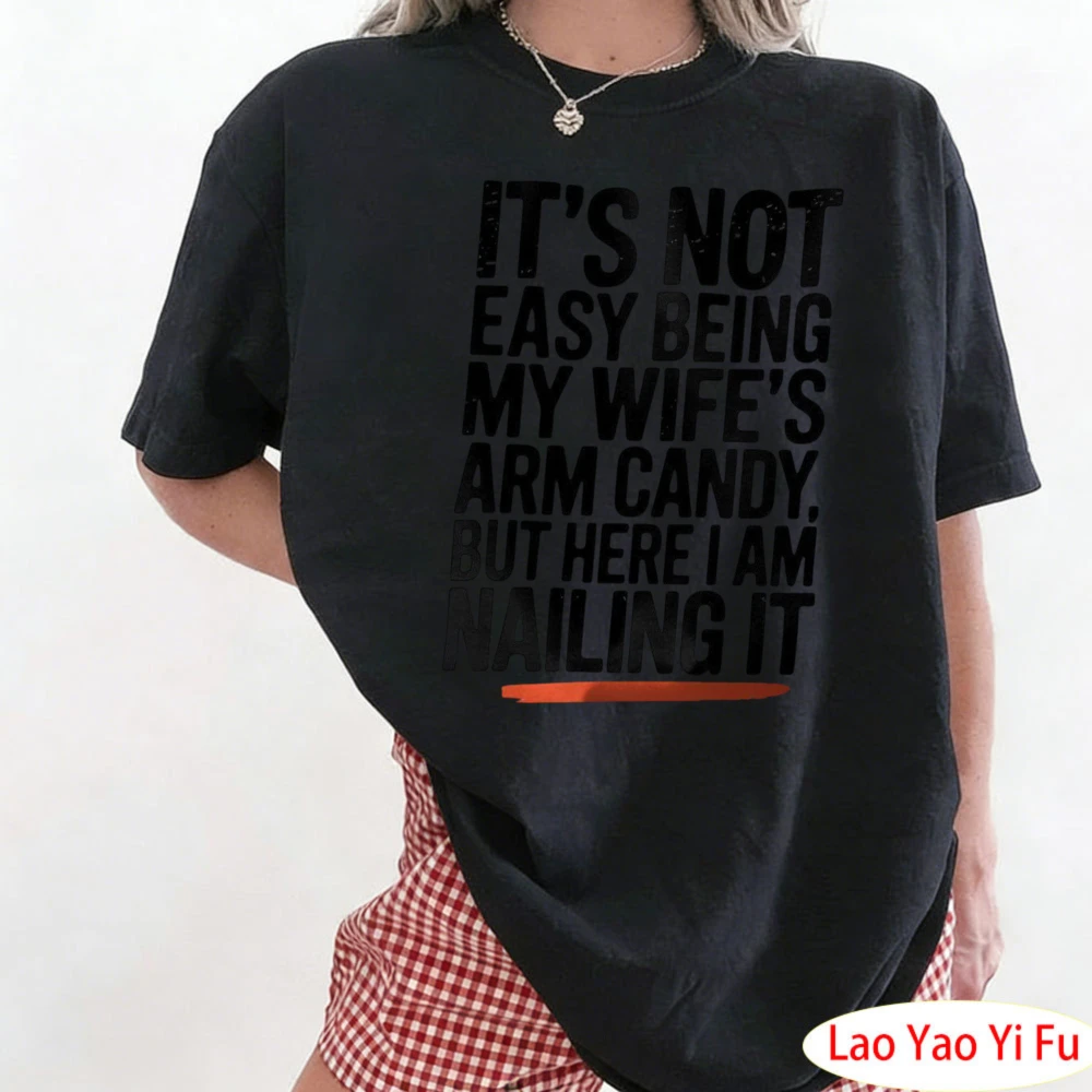 IT'S NOT EASY BEING MY WIFE'S ARM CANDY. BUT HERE LAM NAILING IT Shirt Funny Husband T-Shirt Wife's Arm Candy Design