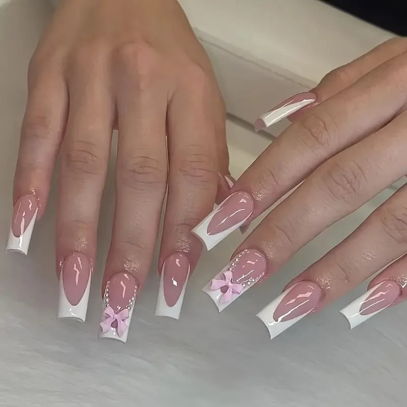 Uñas postizas de Color desnudo, puntas francesas blancas, prensa en las uñas, decoración de perlas con lazo 3D, uñas postizas suaves, dijes, manicura para mujeres