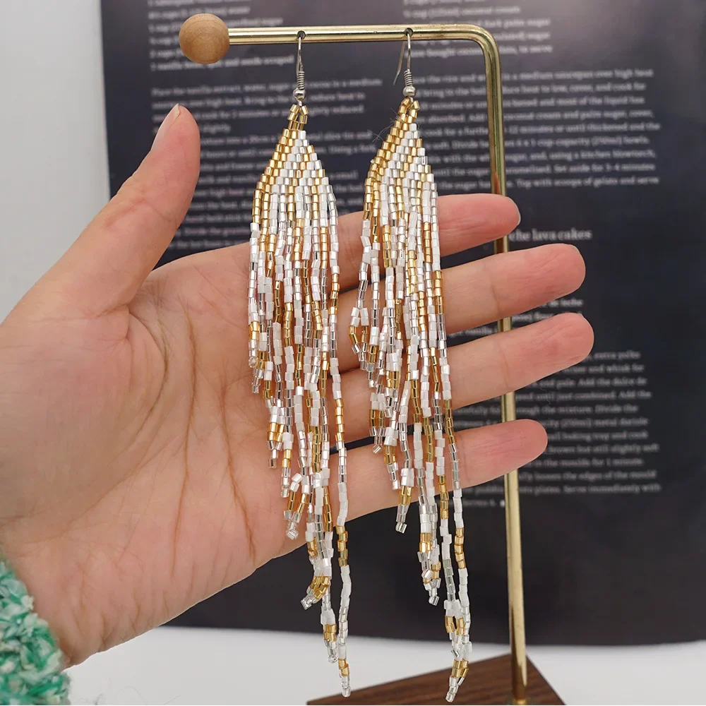 Rice Bead Earrings  Hand knitting  Bohemia  fashion  personality  trapezoid  Simple  geometry  alloy  ma'am  Fringe Earrings