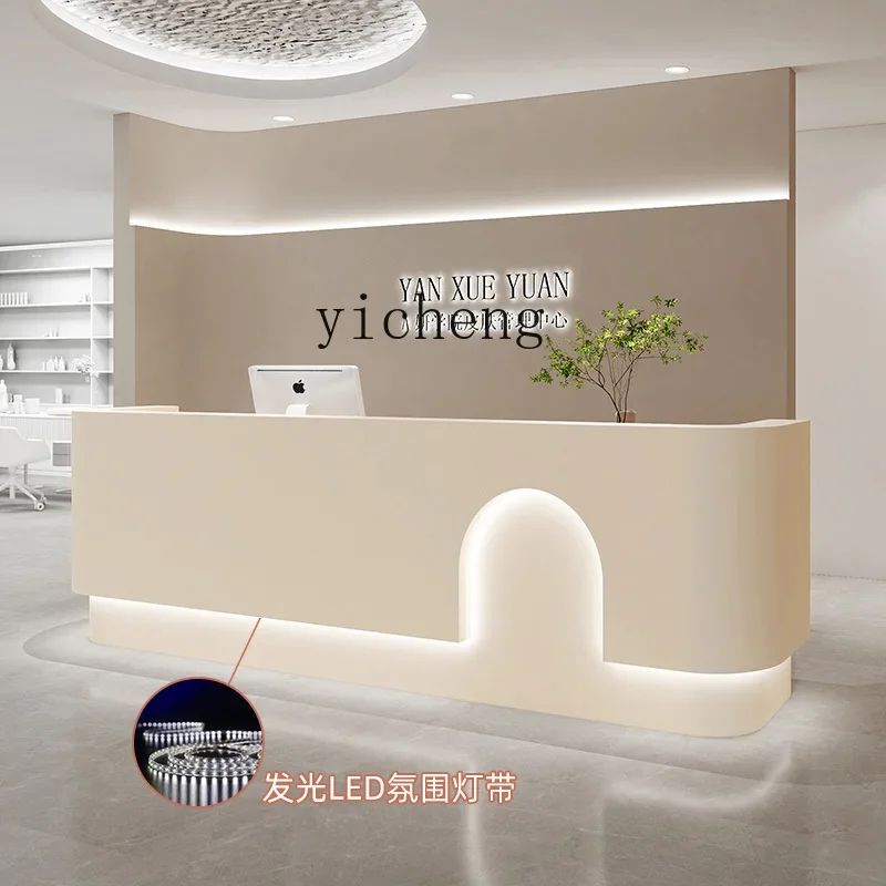 

GZ beauty salon checkout page simple modern clothing store curved bar counter light luxury reception desk