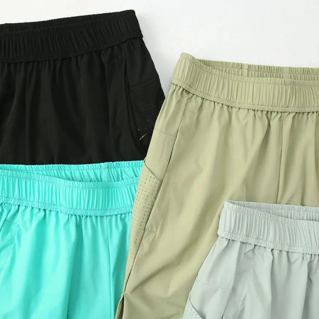 

Laser-Pierced Elastic Side-Bodied Fabric orts Qui-Drng Breathable Fitn Running orts for Men Summer New Sle Casua...