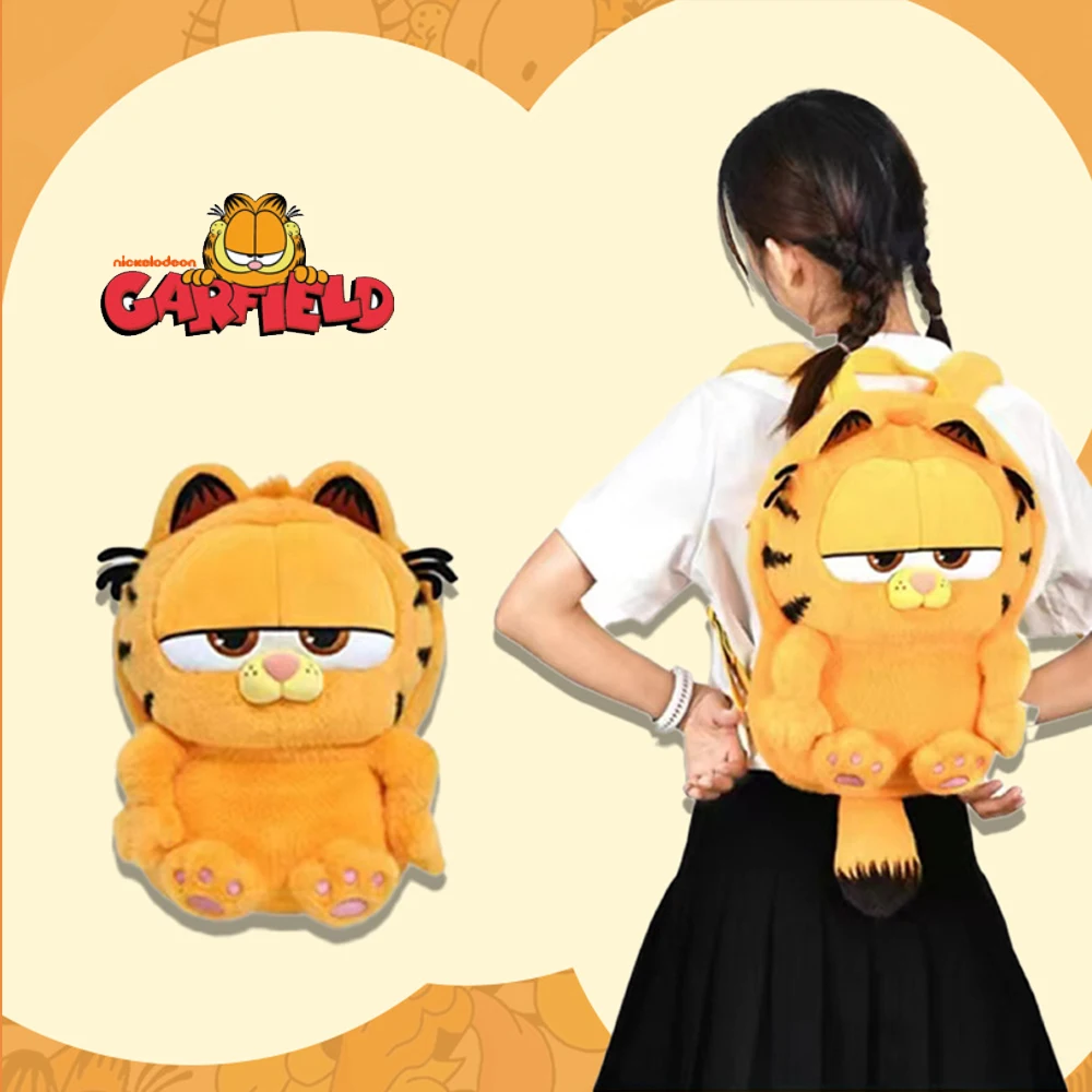GARFIELD Original Plush กระเป๋าเป้สะพายหลังน่ารัก Garfield กระเป๋าสะพายเสื้อคลุมฮาโลวีน Mantle ตุ๊กตาการ์ตูนของขวัญวันเกิดเดียวกัน