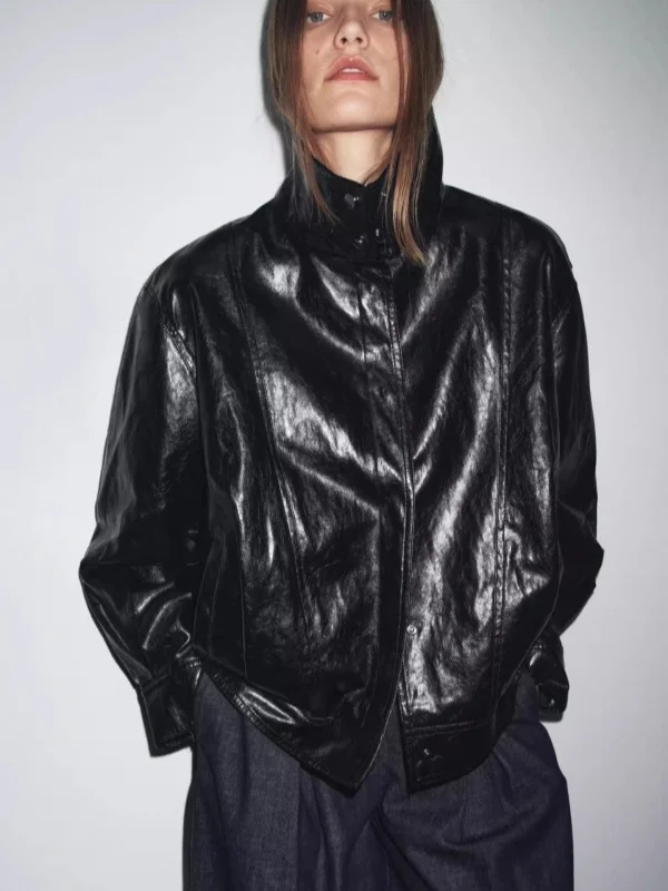 خريف 2025 معطف جايت نسائي أمريكي جديد بياقة عالية طيار أسود محايد Sle من الجلد فضفاض مناسب طويل Sve سحاب للإغلاق