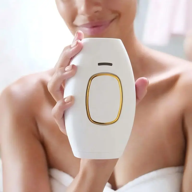 

Женский лазерный аппарат для перманентного безболезненного удаления волос методом IPL. Портативное домашнее устройство для удаления волос на лице.