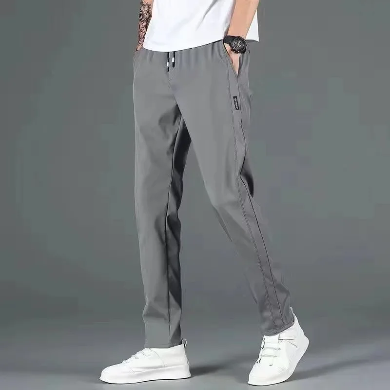 Pantaloni casual estivi da uomo in seta di ghiaccio sottile vestibilità ampia pantaloni sportivi a gamba dritta traspiranti ad asciugatura rapida comodi jeans larghi