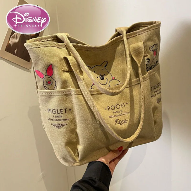 Disney new cartoon Winnie the Pooh retro fashion tote bag women\'s large-capacity canvas commuter shoulder bag