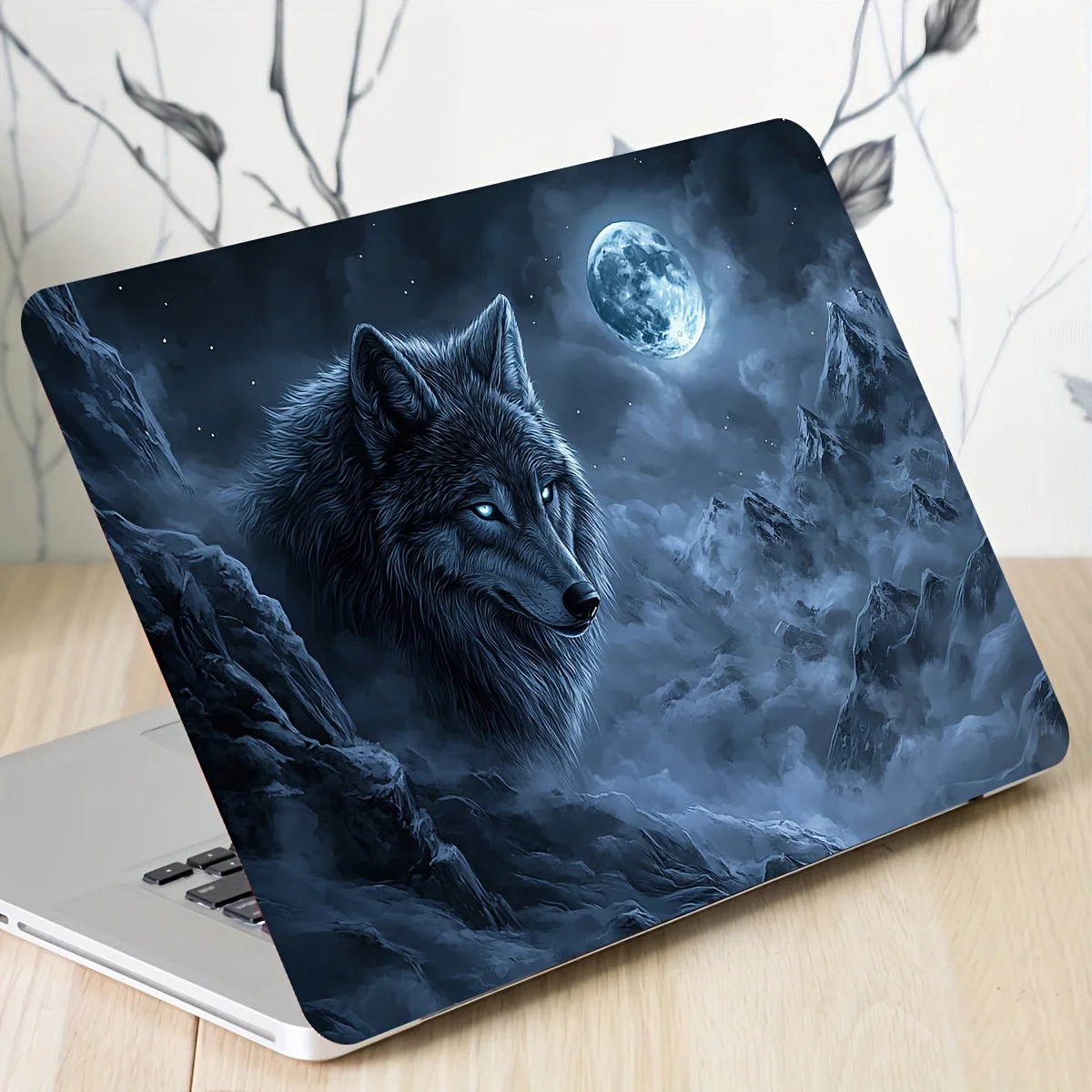 A set of two wolf-themed laptop stickers for netbooks. These waterproof and scratch-resistant stickers can be used on laptops