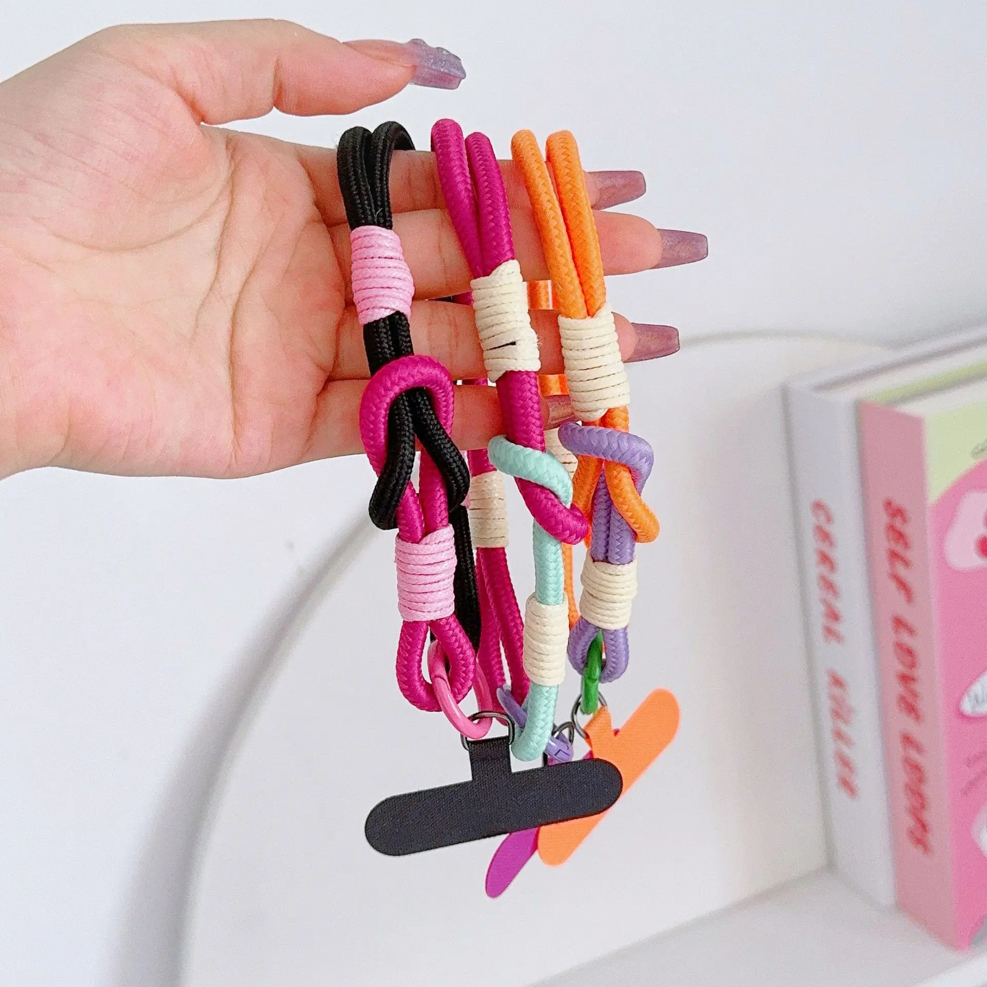 Correia de telefone universal moda criativa corrente curta para novos casos de telefone dopamina dos desenhos animados pulseira de pulso