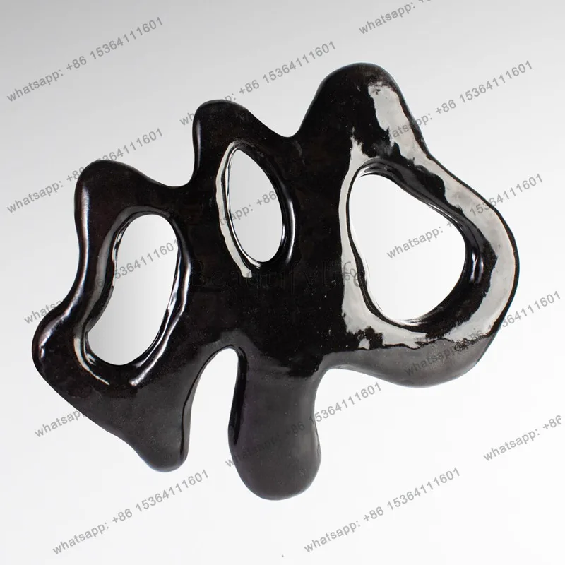 Glossy black irregular hollow wall mirror modern abstract wind decorative mirror