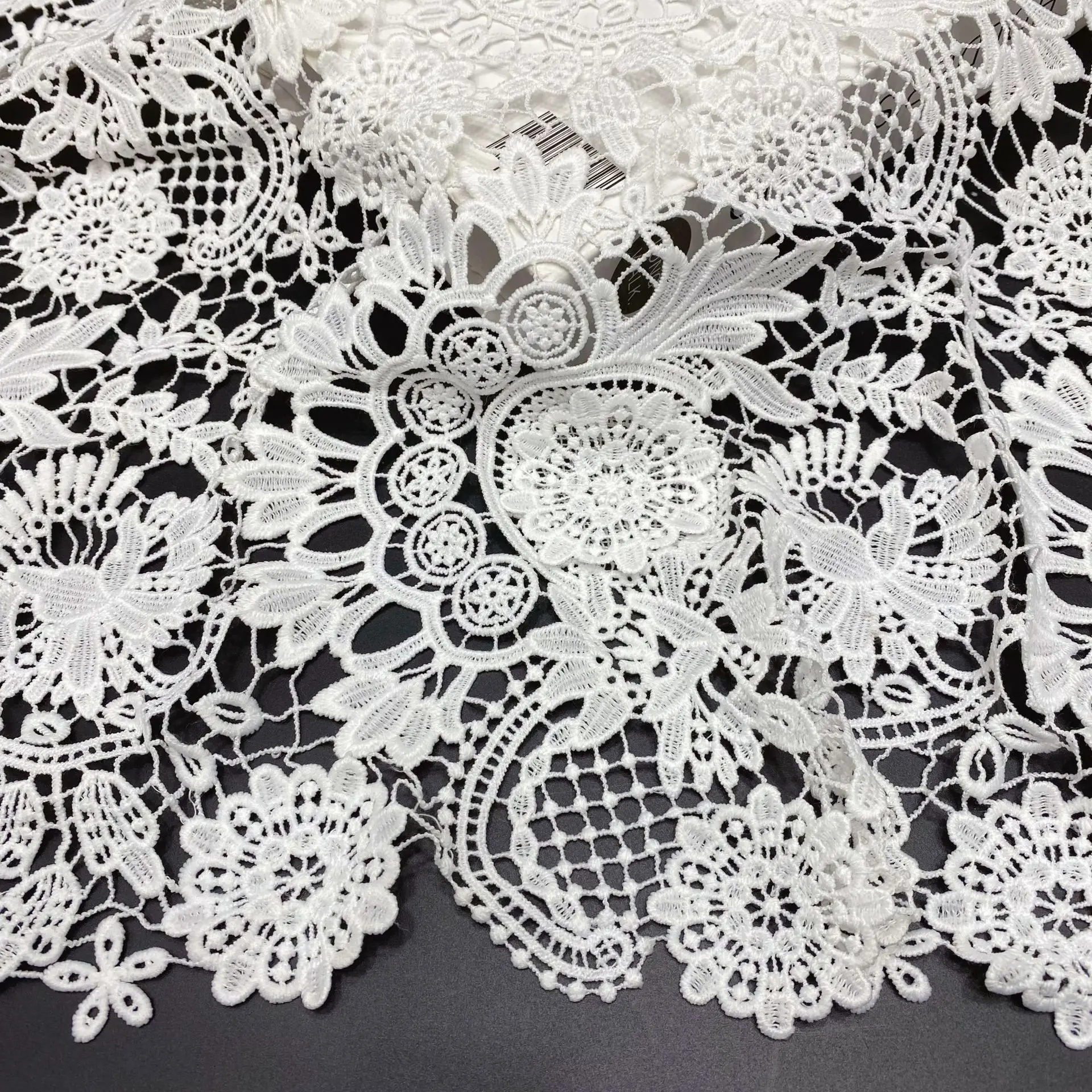 

Full width 3D flower laser embroidered lace fabric water-soluble milk silk hollow Guipure lace fabric for clothing accessories