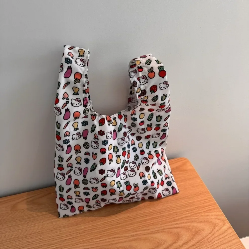 Bolso de mano de Hello Kitty, bolsa de muñeca portátil de gran capacidad, bolsa de caja de arroz, bolsa de almacenamiento de viaje con estampado de dopamina de lona linda, nuevo