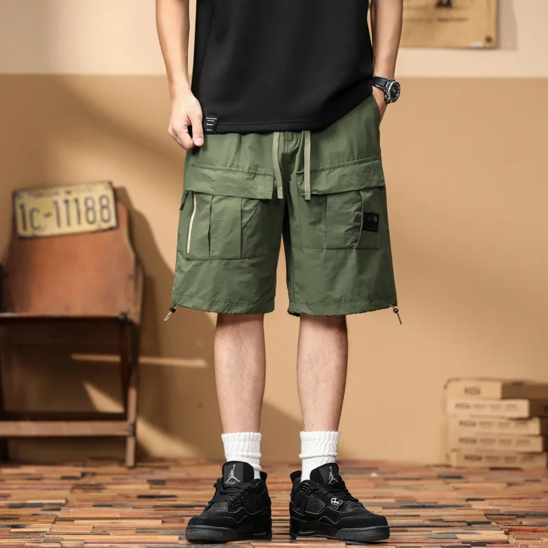 

New men's casual shorts pocket decoration loose type simple casual five quarter pants men